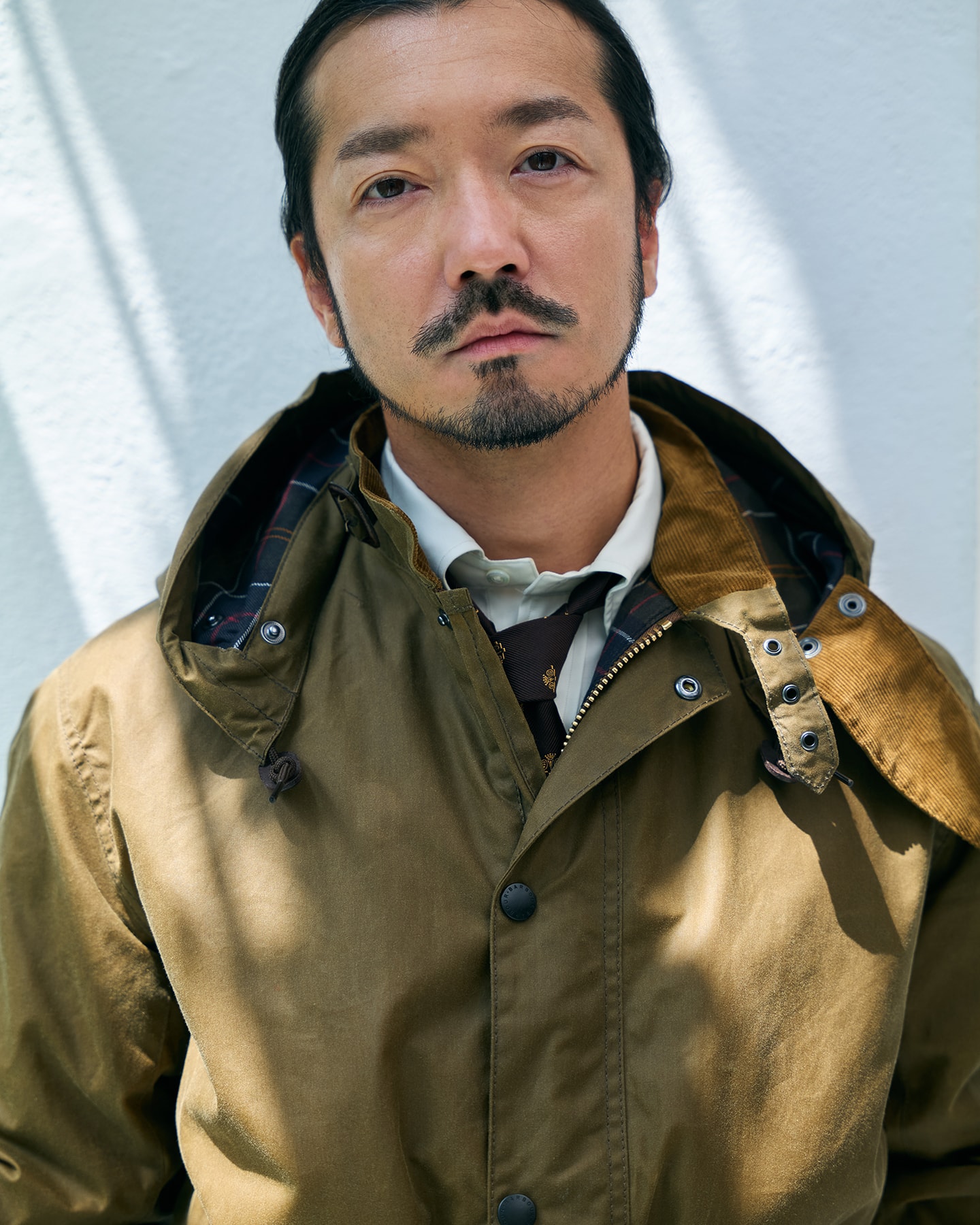 Ursula Wax Jacketを着用した金子ノブアキ氏の顔まわりのカット